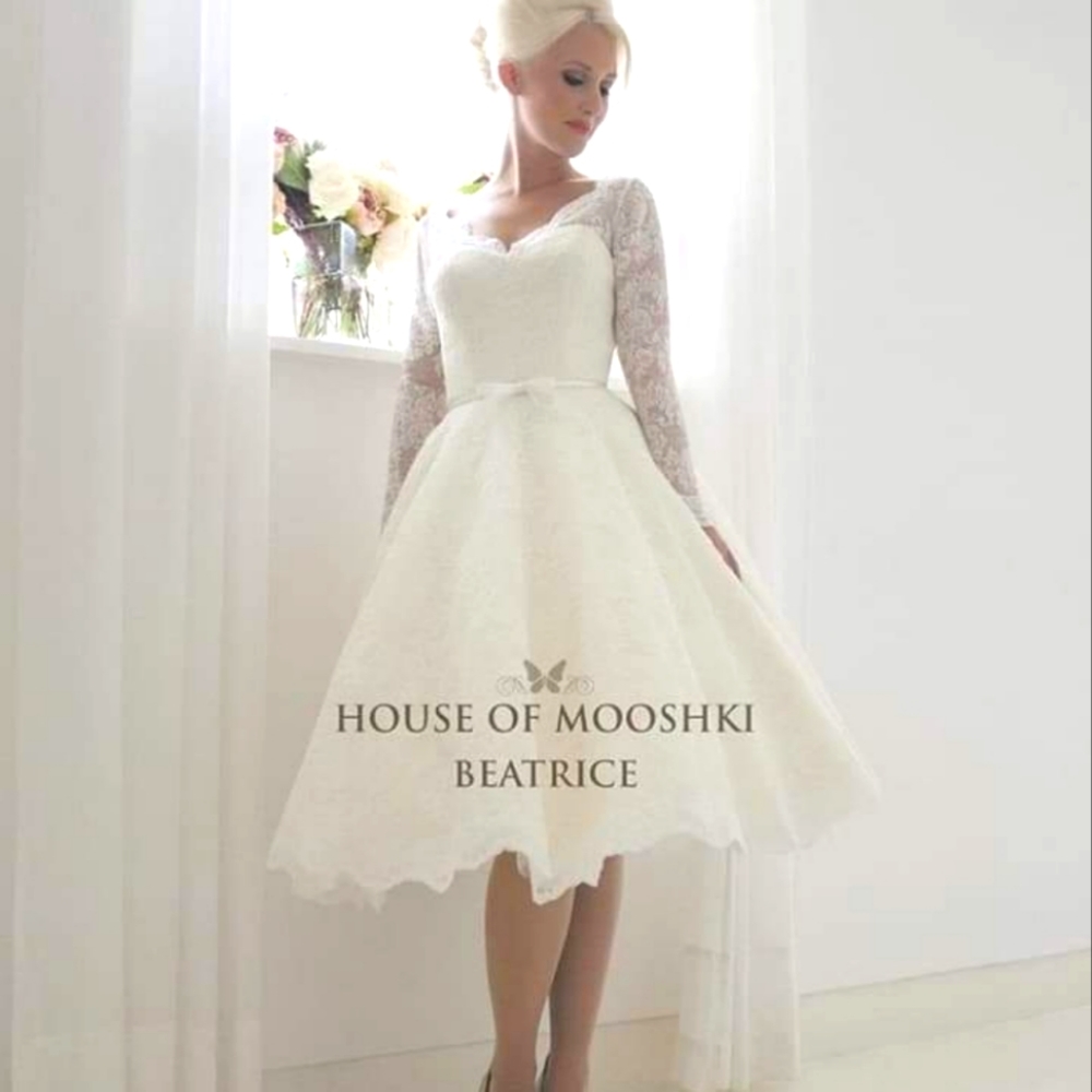 Ivory Wedding dress. Size 16. Tea length vintage style.